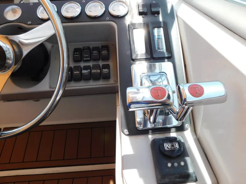 Slide: The Image of Control panel of a 1999 Formula 41 Performance Cruiser boat. - 16