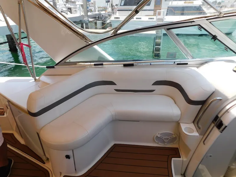 Slide: The Image of 1999 Formula 41 Performance Cruiser interior seating area with white leather upholstery. - 17