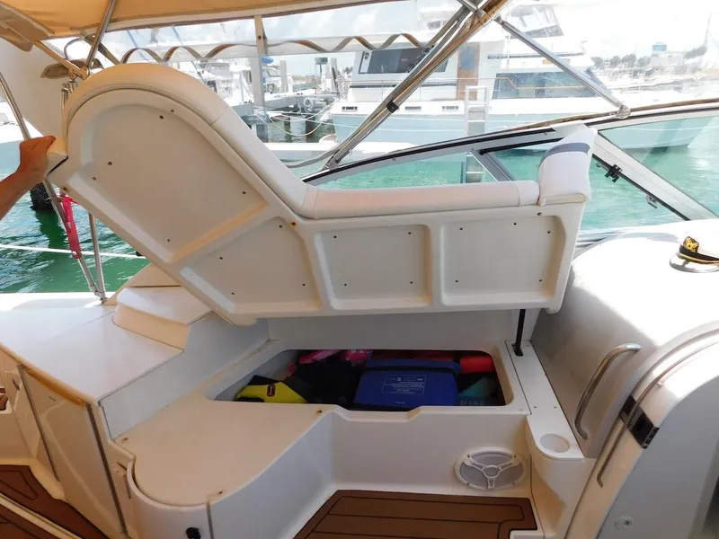 Slide: The Image of 1999 Formula 41 Performance Cruiser with open storage compartment on deck. - 18
