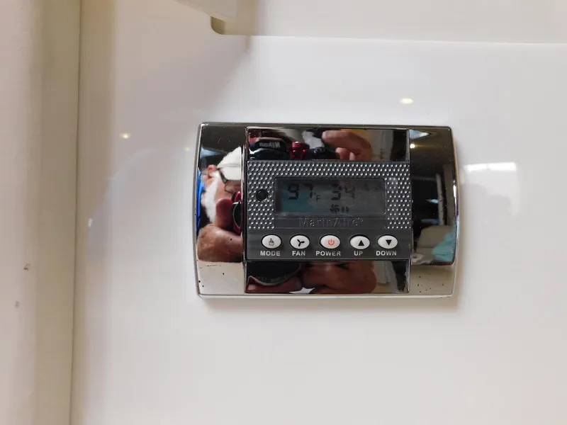 Slide: The Image of Digital control panel on a 1999 Formula 41 Performance Cruiser. - 28