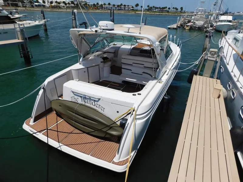 Slide: The Image of 1999 Formula 41 Performance Cruiser docked at marina. - 3