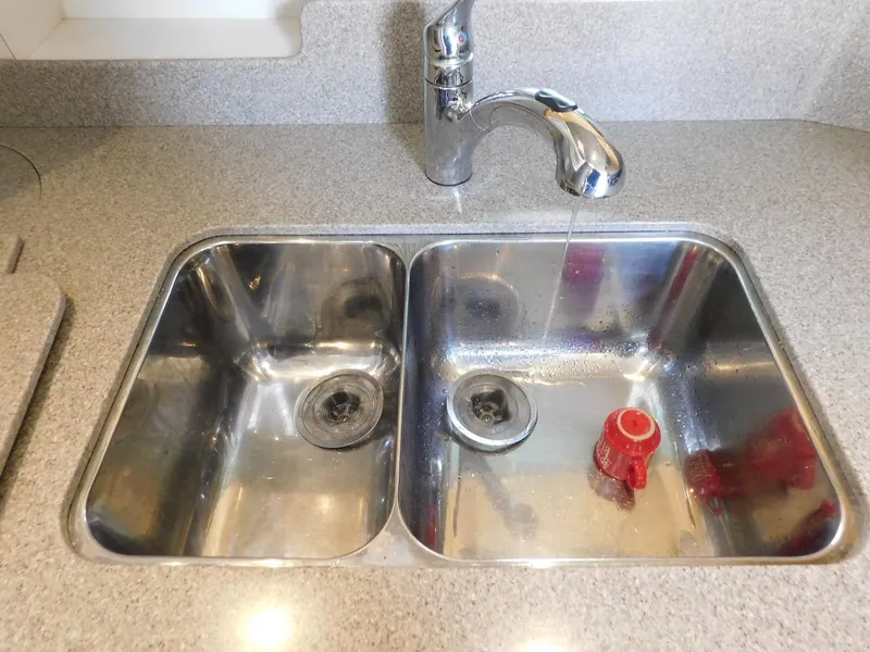 Slide: The Image of 1999 Formula 41 Performance Cruiser stainless steel double sink with faucet. - 38