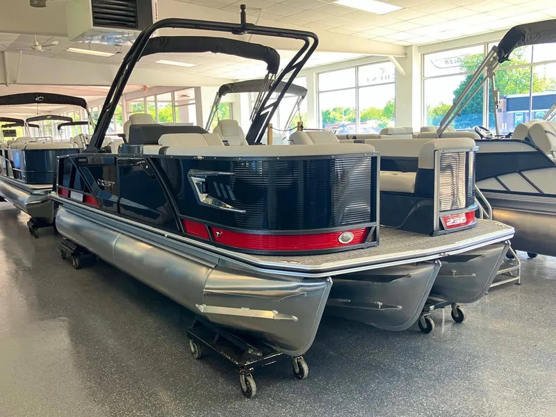 The Image of 2024 Crest Caribbean 230 SLS RS pontoon boat in showroom. - 0