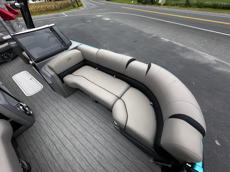 Slide: The Image of 2021 Avalon Excalibur 2585 boat interior with plush seating and modern design. - 15