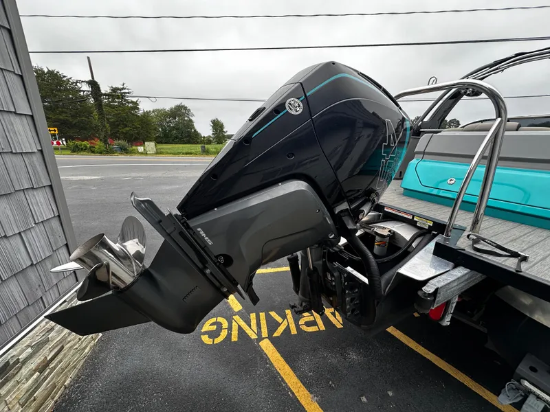 Slide: The Image of 2021 Avalon Excalibur 2585 boat with powerful 450R engine in parking area. - 6
