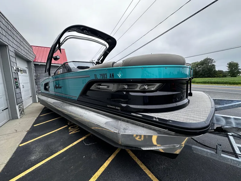 Slide: The Image of 2021 Avalon Excalibur 2585 Windshield Elite Tri Toon boat on trailer. - 8