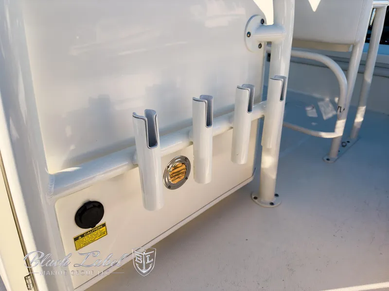 Slide: The Image of 2024 Pathfinder TRS 2200 boat rod holders and seating detail. - 15