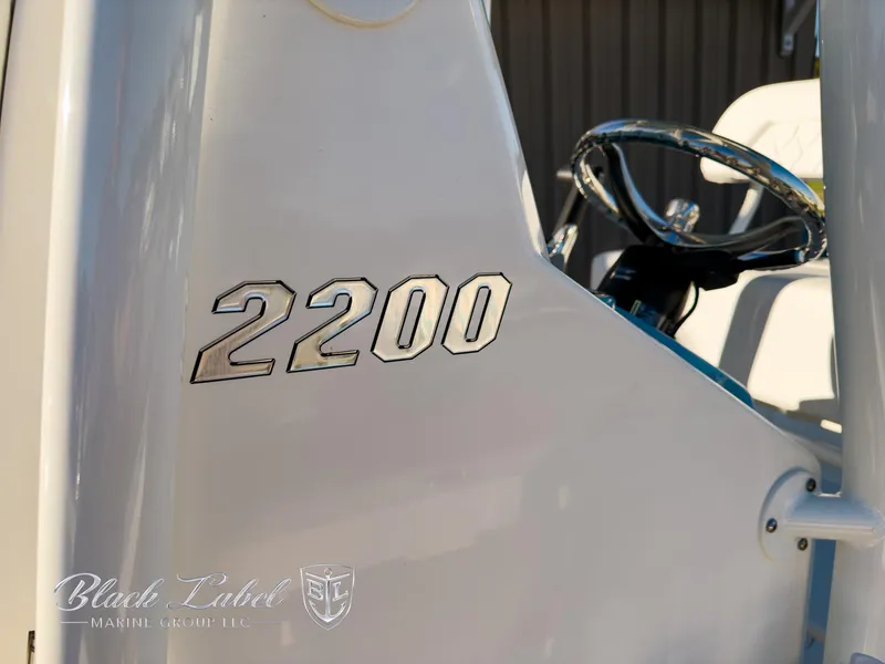 Slide: The Image of 2024 Pathfinder TRS 2200 boat console with steering wheel detail. - 16