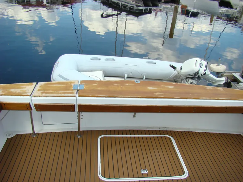 Slide: The Image of 1985 Jersey Dawn 40 boat with wooden deck and inflatable dinghy. - 15
