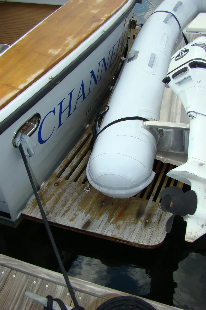 Slide: The Image of 1985 Jersey Dawn 40 boat with inflatable dinghy on wooden platform. - 20
