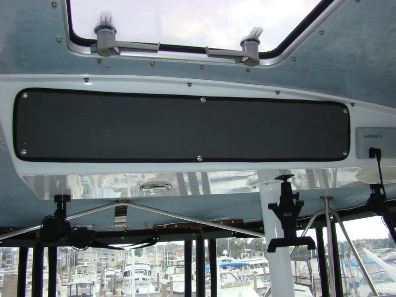 Slide: The Image of Interior view of 1985 Jersey Dawn 40 boat with marina background. - 21