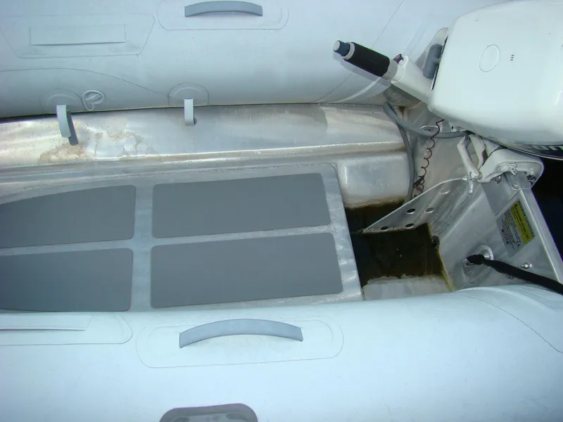 Slide: The Image of 1985 Jersey Dawn 40 inflatable boat interior with motor. - 36