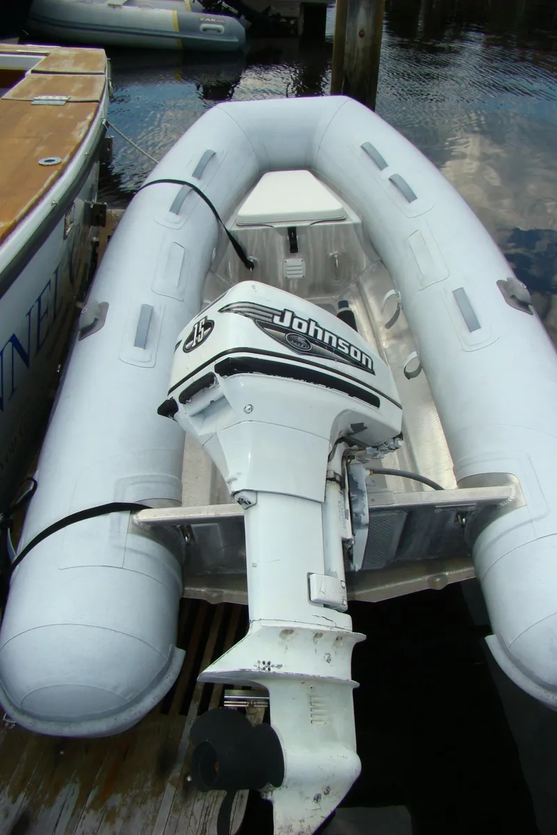 Slide: The Image of 1985 Jersey Dawn 40 inflatable boat with Johnson outboard motor. - 37