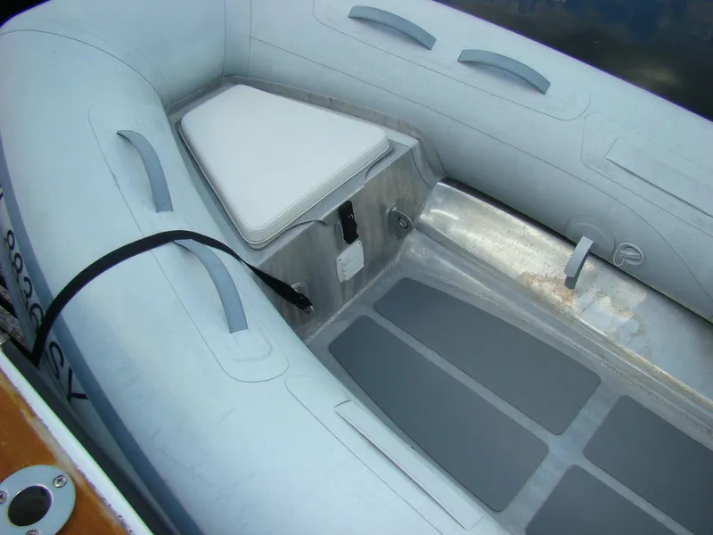 Slide: The Image of Interior of 1985 Jersey Dawn 40 inflatable boat with seating and storage. - 38