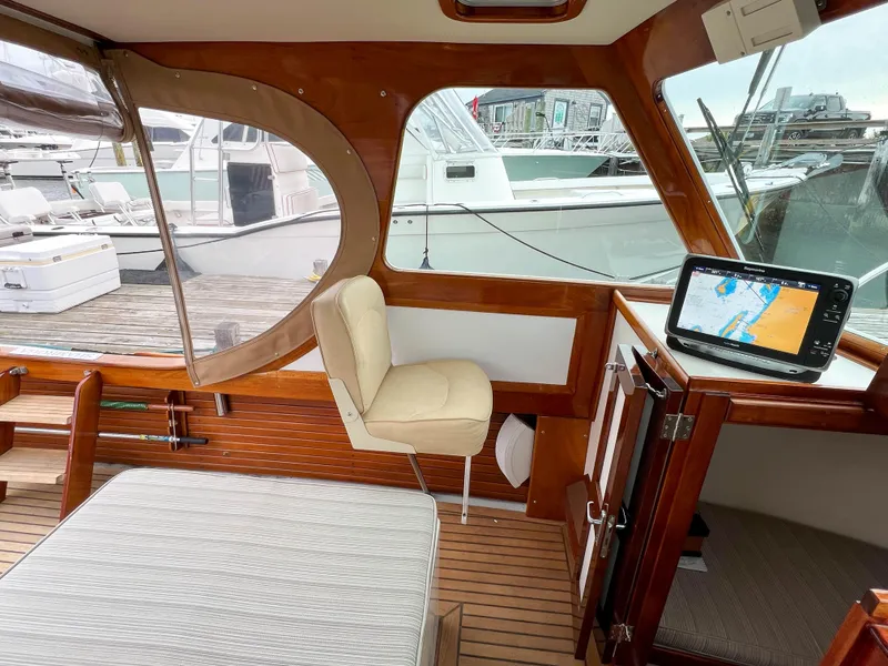 Slide: The Image of Interior of a 2004 Custom Pemaquid Beach 22 boat with navigation system. - 16