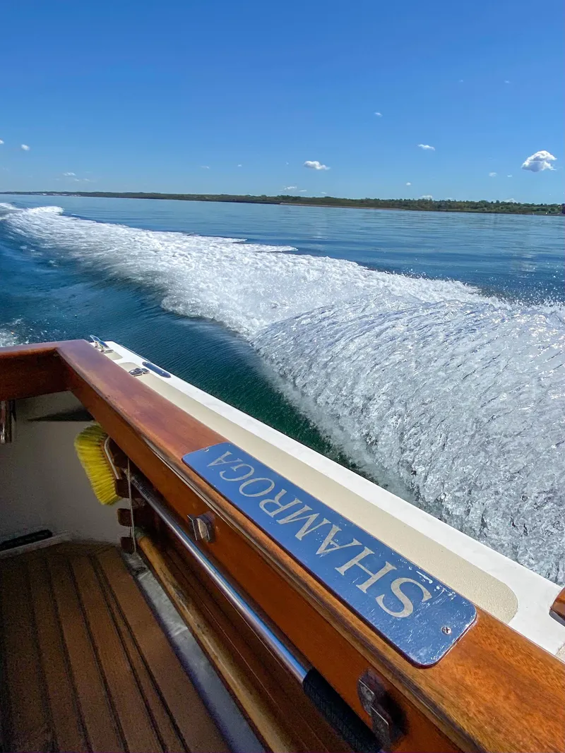 Slide: The Image of Custom 2004 Pemaquid Beach 22 boat cruising on clear blue water. - 5