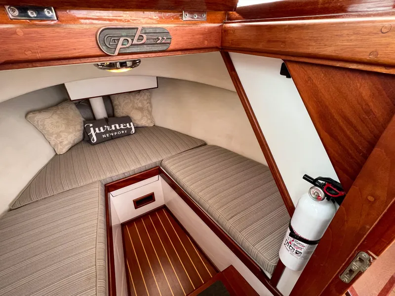 Slide: The Image of Cozy cabin interior of a 2004 Custom Pemaquid Beach 22 boat. - 9