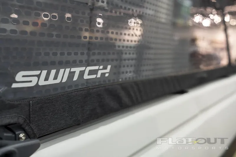 Slide: The Image of Close-up of 2024 Sea-Doo SWITCH Cruise-18 230HP logo on boat. - 28