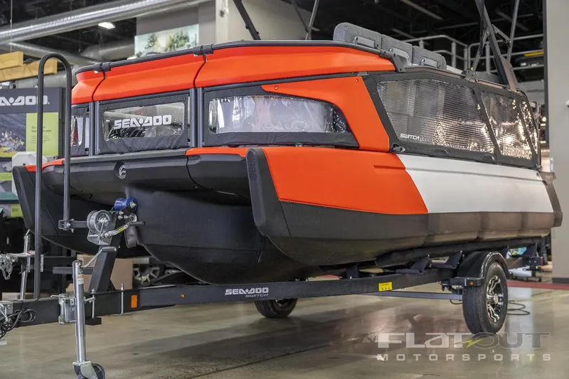 Slide: The Image of 2024 Sea-Doo SWITCH Cruise-18 230HP on trailer in showroom. - 7