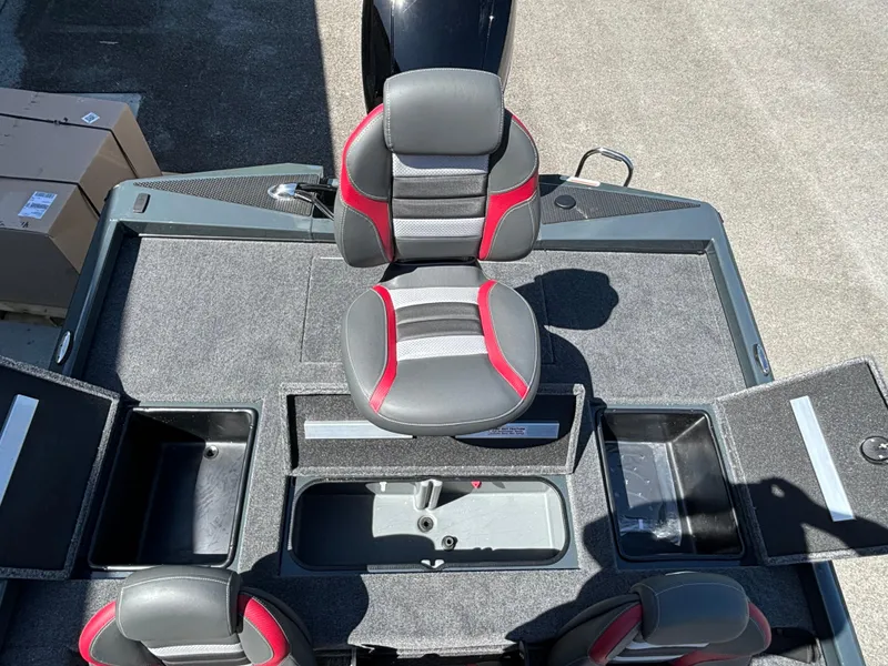 Slide: The Image of 2024 Ranger RT198P boat interior with storage compartments and seating. - 10