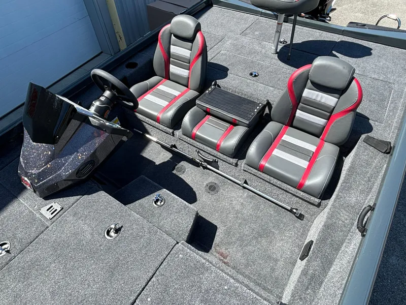 Slide: The Image of 2024 Ranger RT198P boat interior with dual seats and steering console. - 7