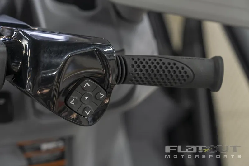 Slide: The Image of Close-up of 2024 Sea-Doo SWITCH CRUISE 18 230HP handlebar controls. - 11