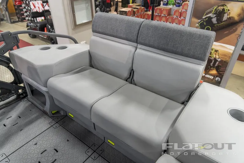 Slide: The Image of 2024 Sea-Doo SWITCH CRUISE 18 230HP interior seating with gray upholstery and cup holders. - 12
