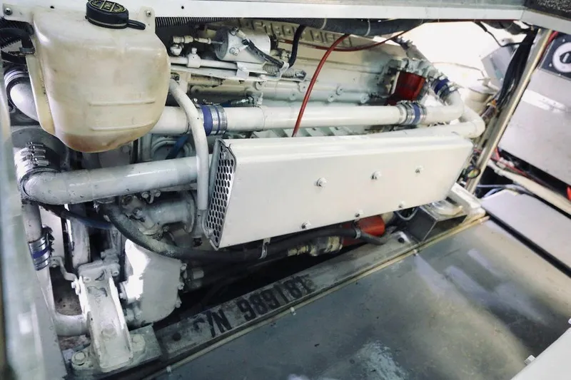 Slide: The Image of Engine compartment of a 1978 Hatteras 37 Convertible boat. - 7