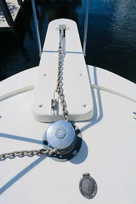 Slide: The Image of Bow of a 1978 Hatteras 37 Convertible yacht with anchor chain and windlass. - 8