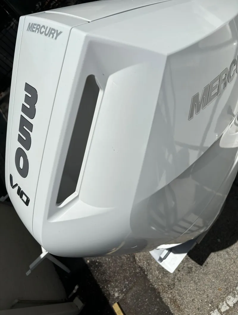 Slide: The Image of Close-up of a 2024 World Cat 325 DC with a Mercury V10 outboard engine. - 3