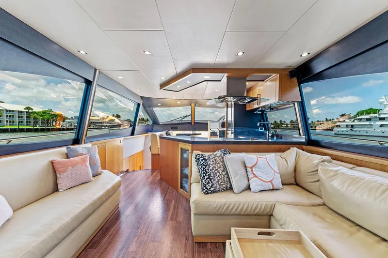 Slide: The Image of Luxurious interior of 2014 Lazzara 64 yacht with panoramic windows and modern furnishings. - 19