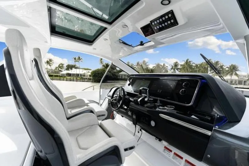 Slide: The Image of 2023 Azimut Verve 42 yacht cockpit with modern controls and luxurious seating. - 11