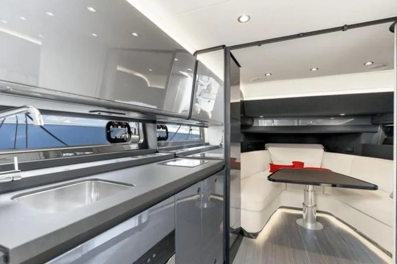 Slide: The Image of Luxurious interior of 2023 Azimut Verve 42 yacht with modern kitchen and seating area. - 17
