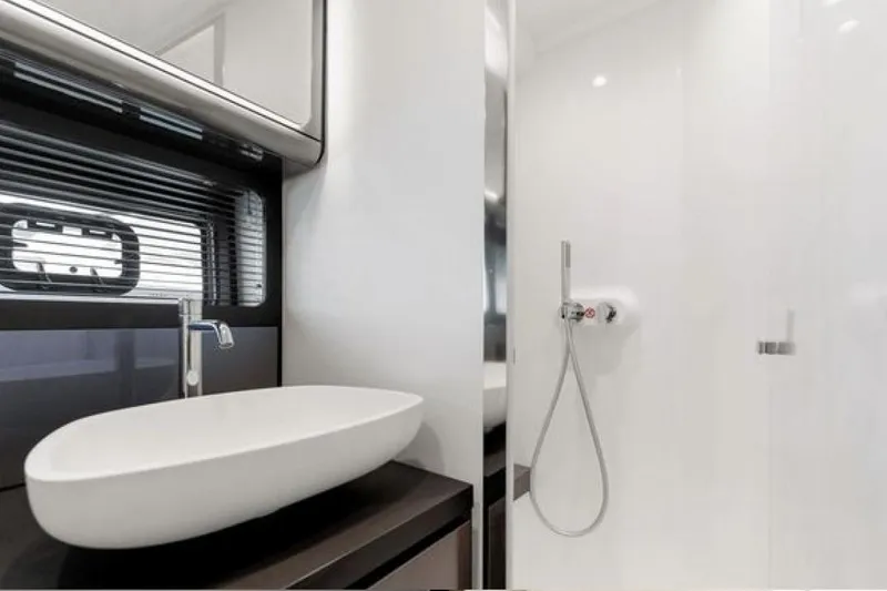 Slide: The Image of Luxurious bathroom in 2023 Azimut Verve 42 yacht with modern sink and shower. - 20