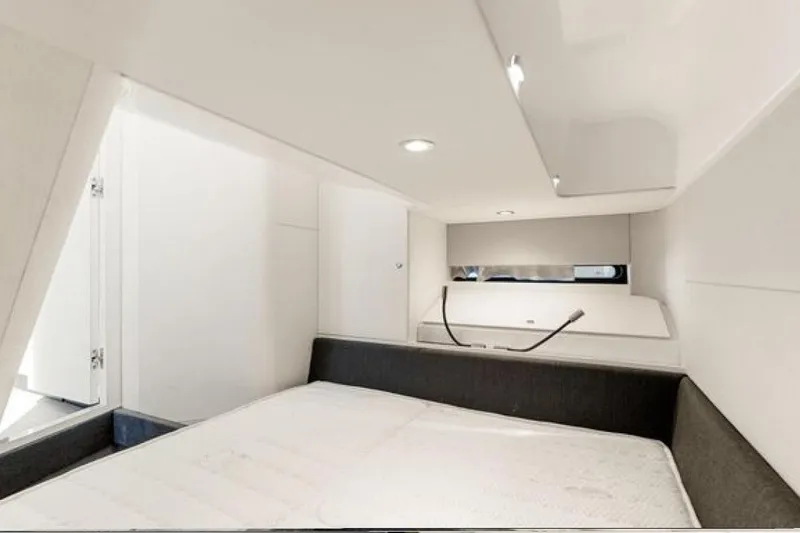 Slide: The Image of Interior cabin of 2023 Azimut Verve 42 yacht, featuring modern design and comfortable bedding. - 25