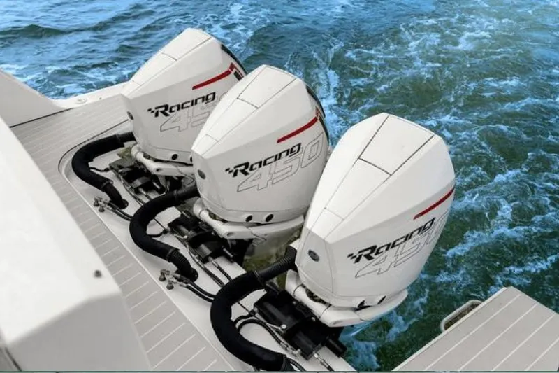 Slide: The Image of Triple outboard engines on 2023 Azimut Verve 42 boat, cruising on water. - 35