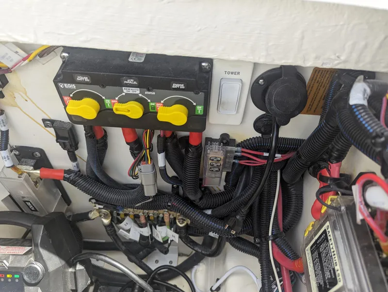Slide: The Image of Electrical panel and wiring of a 2024 Sea Ray SDX 270 boat. - 35