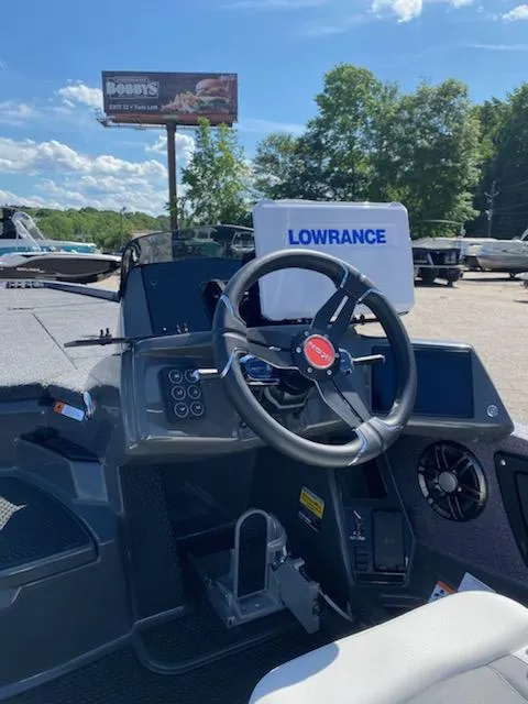 Slide: The Image of 2024 iKon LX20 boat dashboard with Lowrance navigation system. - 8