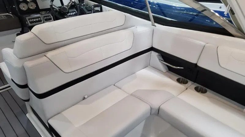 Slide: The Image of 2023 Formula 350 Crossover Bowrider I/O interior seating area with white upholstery. - 16