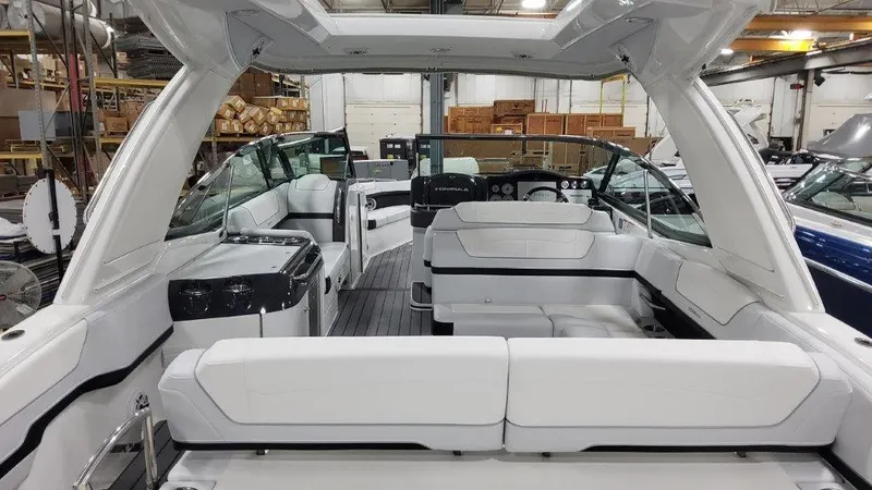 Slide: The Image of 2023 Formula 350 Crossover Bowrider I/O interior, featuring spacious seating and modern design. - 19