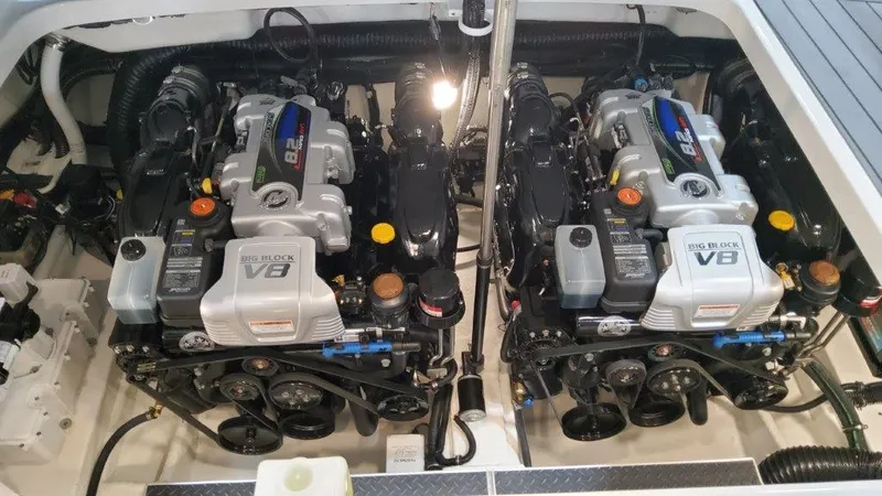 Slide: The Image of Twin V8 engines in a 2023 Formula 350 Crossover Bowrider I/O boat. - 20