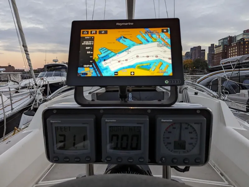 Slide: The Image of Navigation system on 1985 O'Day 35 sailboat, displaying colorful map and digital gauges. - 3