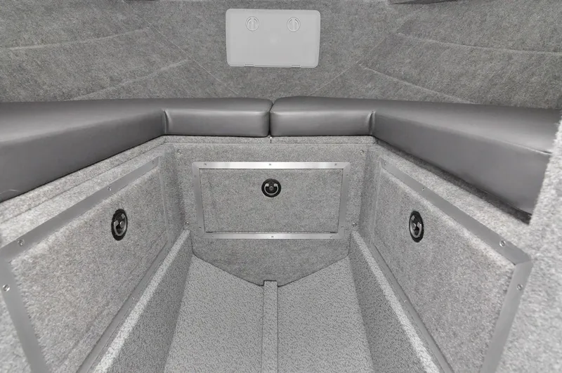 Slide: The Image of 2024 Spartan 2600 Olympia interior with compact kitchenette, storage, and modern appliances. - 17
