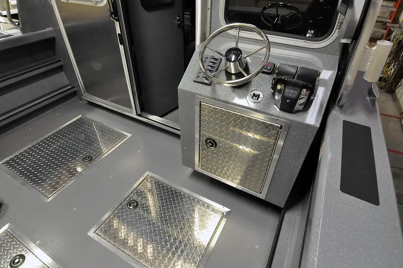 Slide: The Image of 2024 Spartan 2600 Olympia interior with dining area and cushioned seating. - 20