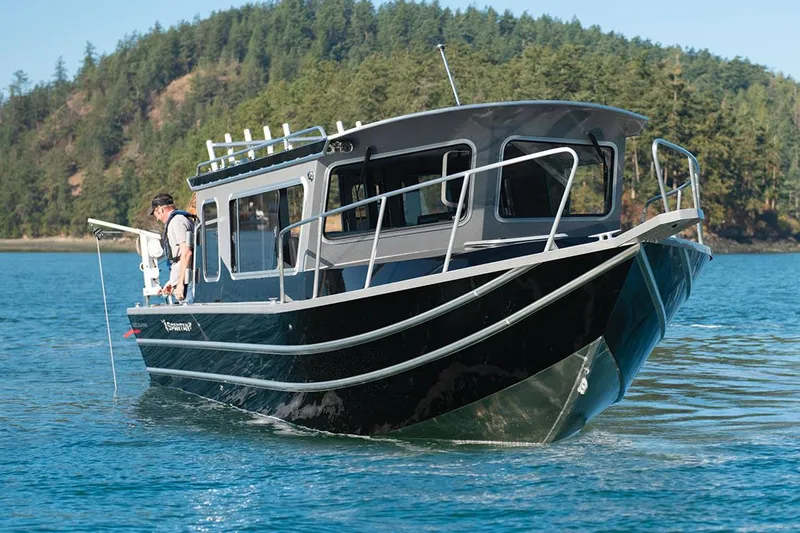 Slide: The Image of 2024 Spartan 2600 Olympia boat on trailer with Mercury outboard engine. - 7