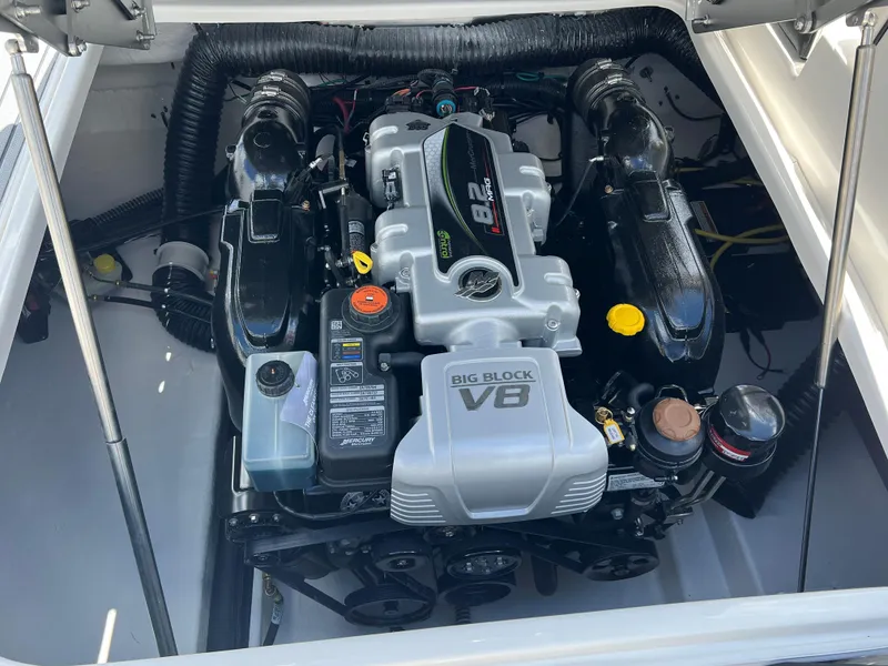 Slide: The Image of 2024 Chaparral 287 SSX boat engine compartment with Big Block V8 engine. - 2