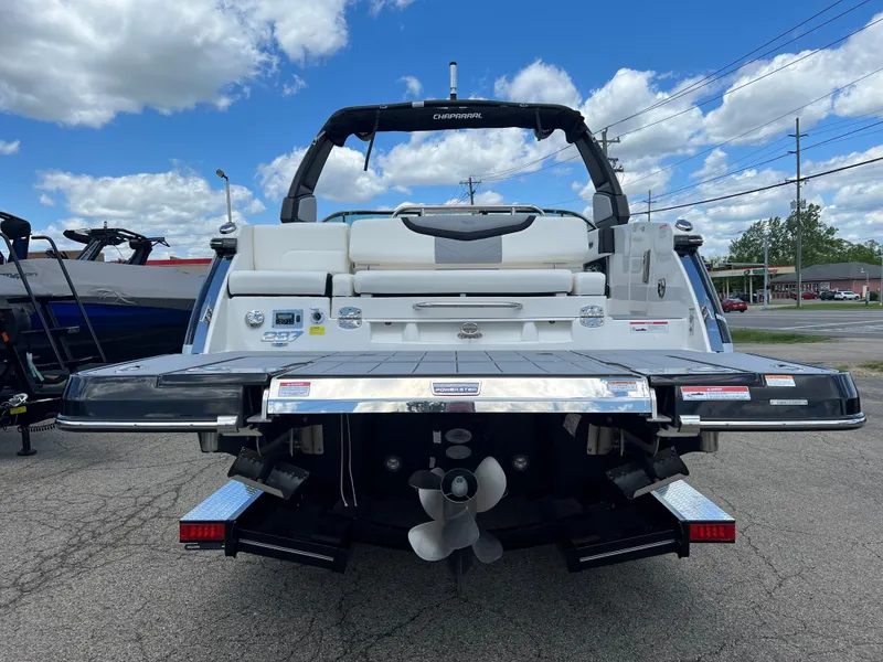 Slide: The Image of 2024 Chaparral 287 SSX boat rear view with swim platform and propeller. - 9