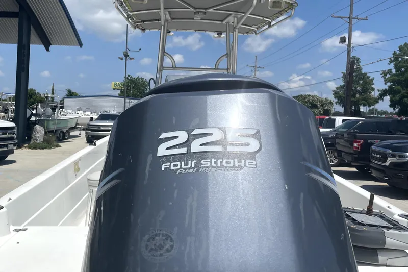 Slide: The Image of 2004 Skeeter ZX 2400 boat with 225 Four Stroke engine in a dealership lot. - 3