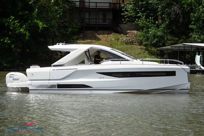 The Image of 2024 Jeanneau DB/37 OB luxury motorboat on a lake. - 0