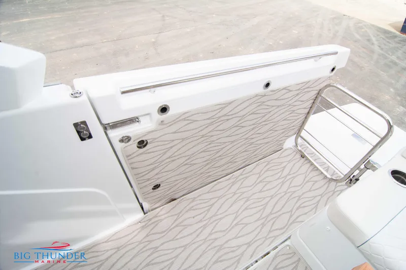Slide: The Image of 2024 Jeanneau DB/37 OB boat interior with patterned flooring and side panel. - 19